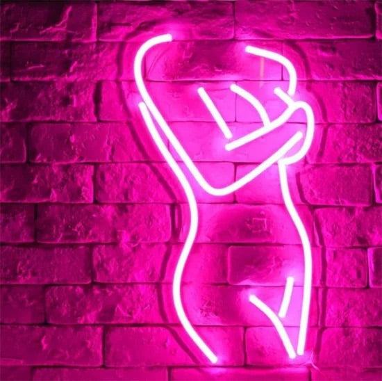 Sagoma donna 2 neon pink neon light silhouette on brick wall background