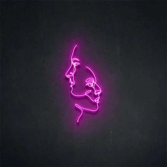 Volti neon pink double face outline light on dark wall